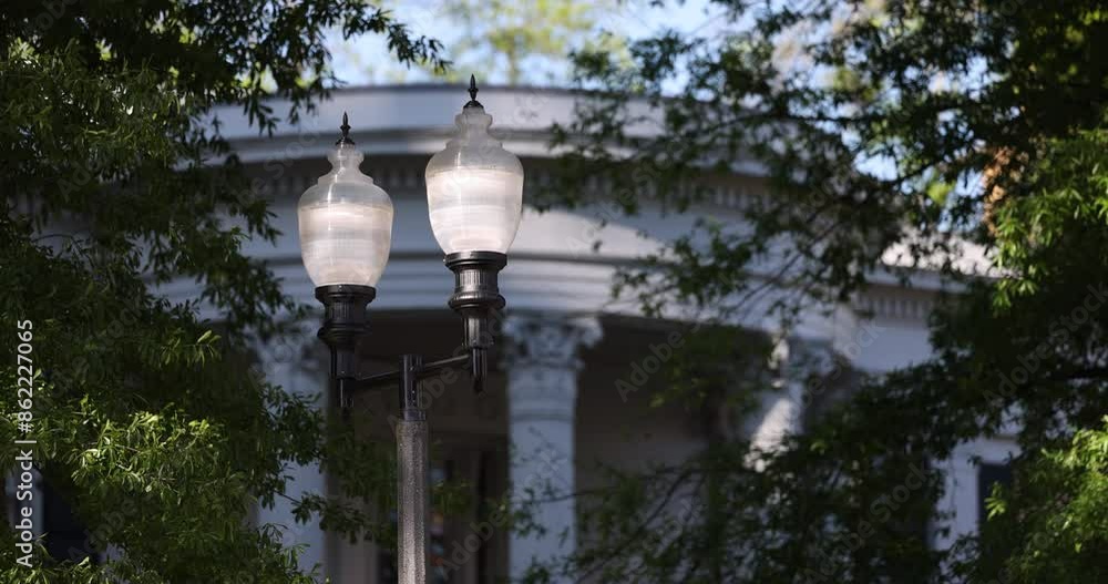 Sunset view of a historic street lamp and downtown buildings of Jackson, Mississippi, USA. Sunset view of a historic street lamp and downtown buildings of Jackson, Mississippi, USA.