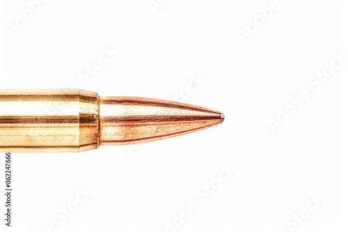 Close-up image of a single bullet with a white background. Ideal for articles or topics related to ammunition or firearms. photo