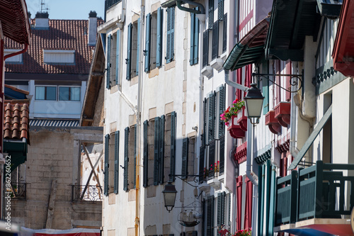 White houses and villas of old Saint Jean de Luz on Basque coast, famous resort, known for beautiful architecture, nature and cuisine, South of France, Basque Country