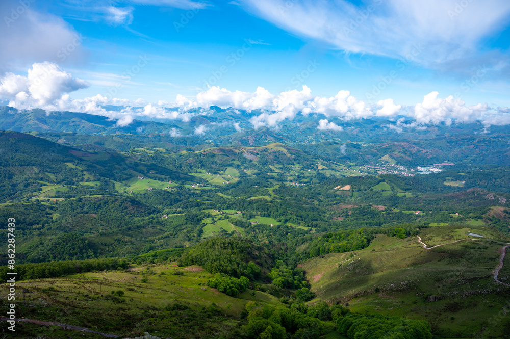 Fototapeta premium Travelling by old wooden train up to Larrun or La Rhune, Larhune mountain at the western end of the Pyrenees located on border of France and Spain, in traditional Basque provinces Labourd and Navarra