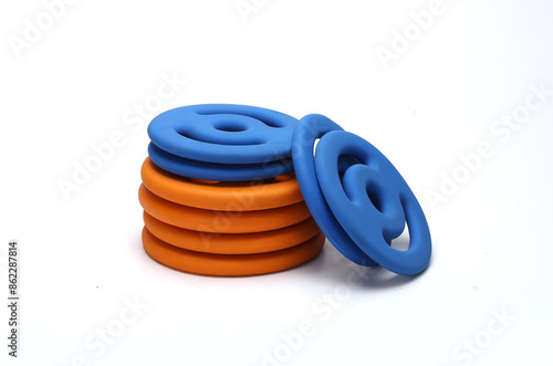 neoprene rubber coated colorful gym wieght plates isolated on white background