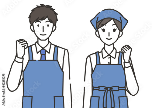ガッツポーズの店員の男性と女性