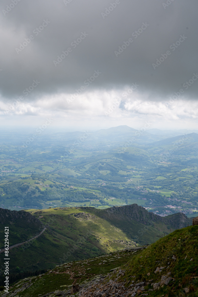 Fototapeta premium Travelling by old wooden train up to Larrun or La Rhune, Larhune mountain at the western end of the Pyrenees located on border of France and Spain, in traditional Basque provinces Labourd and Navarra