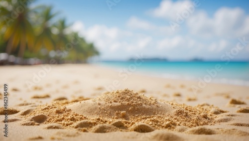 Sand with blurred Palm and tropical beach bokeh background, Summer vacation and travel concept Copy space.