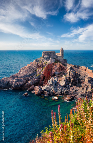 Fototapeta Naklejka Na Ścianę i Meble -  Sunny morning view of Saint Peter Church in Portovenere town. Picturesque spring seascape of Mediterranean sea,  Liguria, province of La Spezia, Italy, Europe. Traveling concept background.