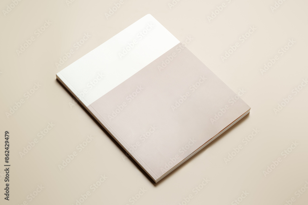 Stack of blank paper on beige background