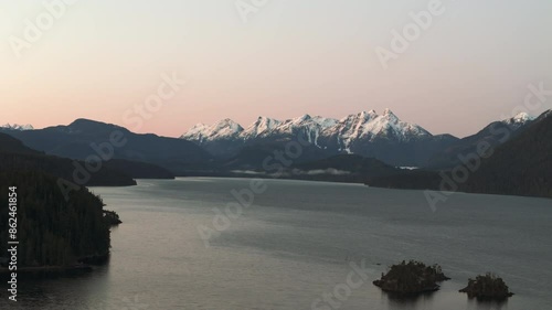 First Light on Nimpkish Lake: Snow-Covered Peaks and Tranquil Water photo