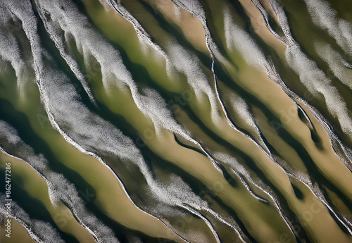 Aerial view of river creating an abstract pattern.AI generated