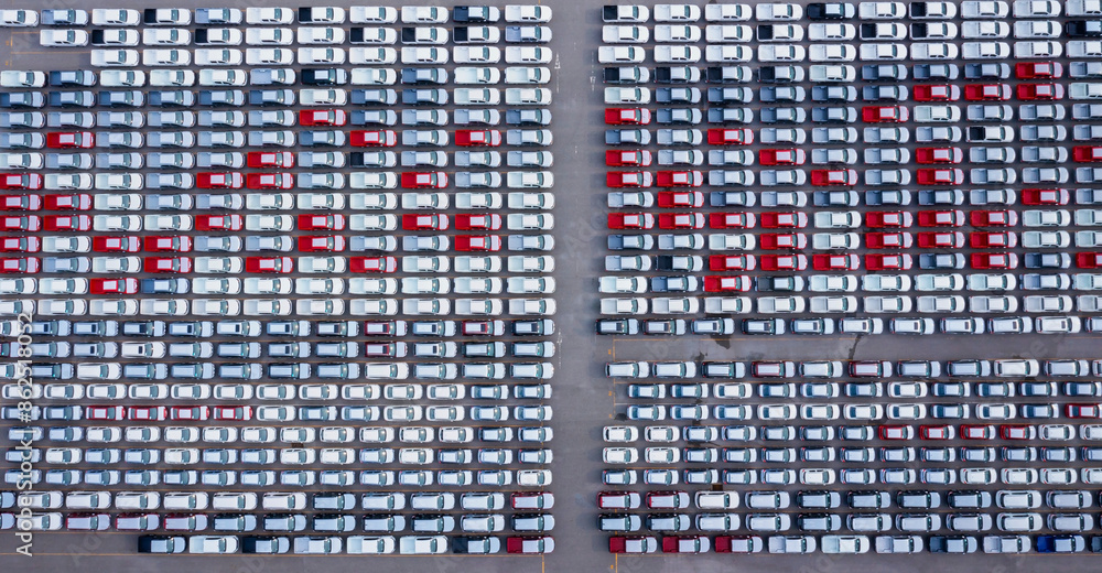 Top view of new automobiles background which lined up in the port for import and export business logistic to dealership for sale Top view of new automobiles background which lined up in the port for import and export business logistic to dealership for sale