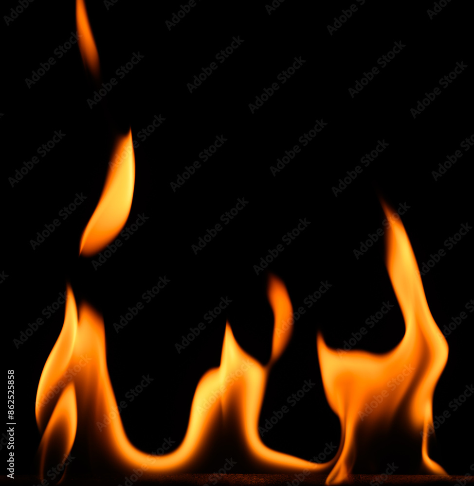 fire on a black background, burning and hot flames, close view fire on a black background, burning and hot flames, close view