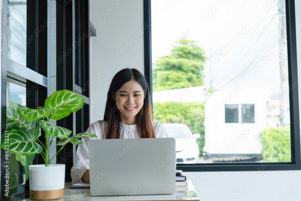 Businesswomen drive online store success together. Businesswomen drive online store success together.