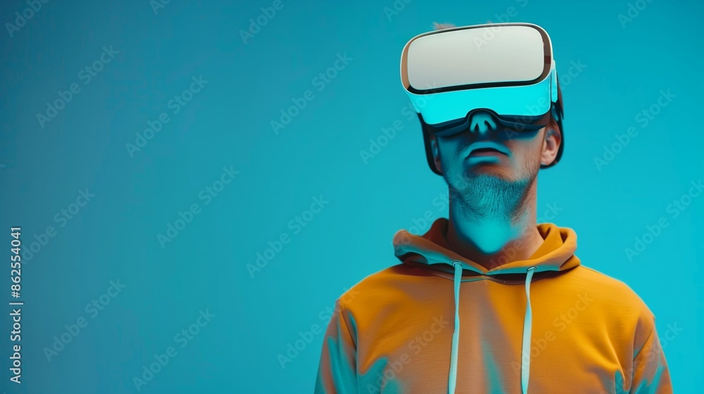 Background with a man in VR glasses. Augmented reality helmet. Virtual reality glasses. Modern technologies. Future technologies Background with a man in VR glasses. Augmented reality helmet. Virtual reality glasses. Modern technologies. Future technologies