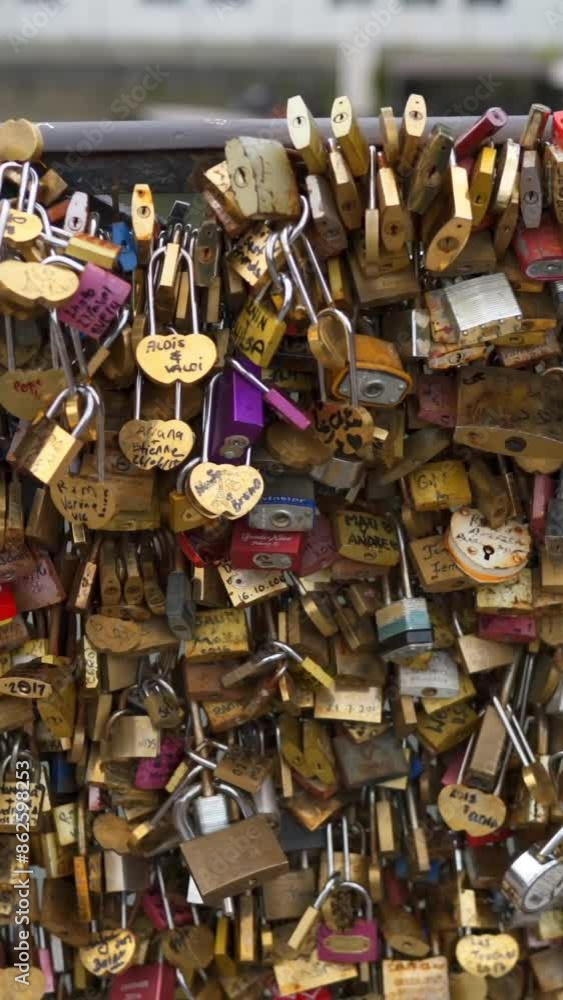 The Locks of Love Of Montmartre Paris. Huge amount of wedding symbols on bridge. 4K UHD. Vertical shot. The Locks of Love Of Montmartre Paris. Huge amount of wedding symbols on bridge. 4K UHD. Vertical shot.