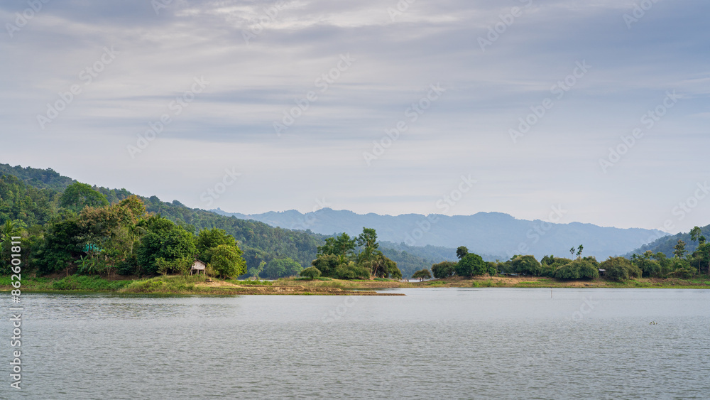 Scenic landscape panorama on picturesque Kaptai lake under moody sky, Rangamati, Chittagong, Bangladesh
Scenic landscape panorama on picturesque Kaptai lake under moody sky, Rangamati, Chittagong, Bangladesh