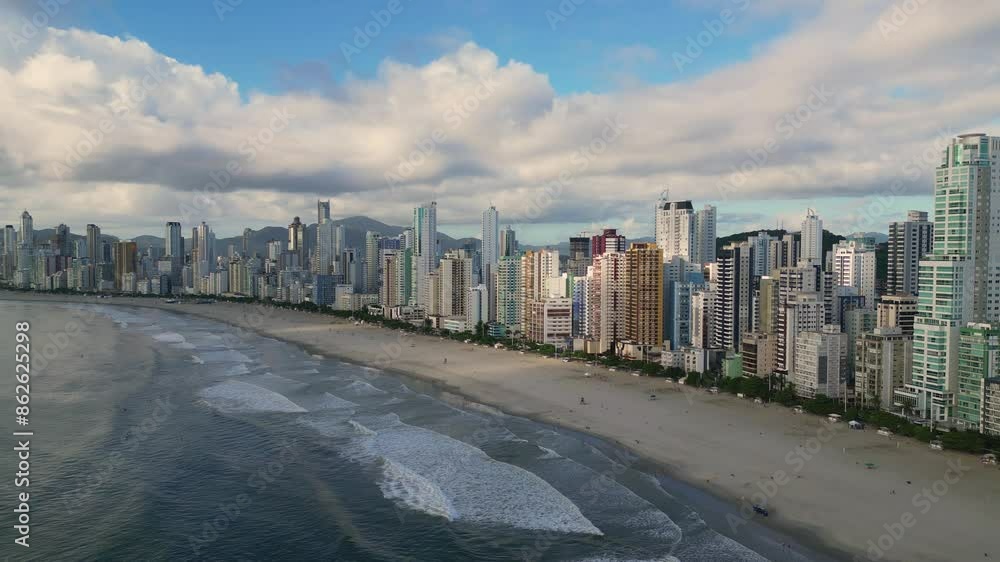Reverse Dolly aerial view from Central Beach (Praia Central) and it oceanfront skyscrapers of Balneario Camboriu during morning time - Santa Catarina, Brazil Reverse Dolly aerial view from Central Beach (Praia Central) and it oceanfront skyscrapers of Balneario Camboriu during morning time - Santa Catarina, Brazil