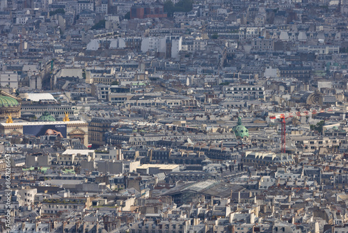 Aerial view of densely populated historic old town with medieval buildings and rooftops, Paris, France. photo