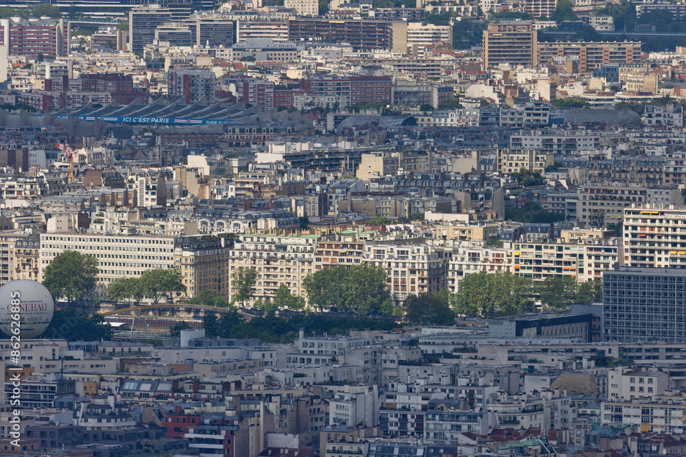 Aerial view of dense metropolitan Paris with scenic river Seine and crowded city center, Ile de France, France. Aerial view of dense metropolitan Paris with scenic river Seine and crowded city center, Ile de France, France.