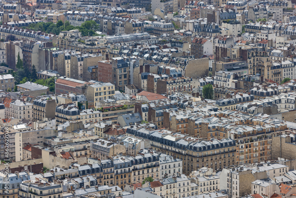 Aerial view of dense historic buildings and famous Parisian rooftops, Paris, France. Aerial view of dense historic buildings and famous Parisian rooftops, Paris, France.
