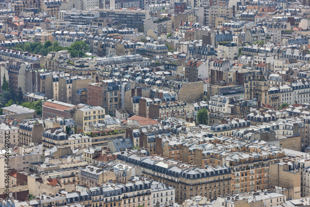 Aerial view of crowded Paris metropolis with scenic Seine river, Ile de France, France. Aerial view of crowded Paris metropolis with scenic Seine river, Ile de France, France.