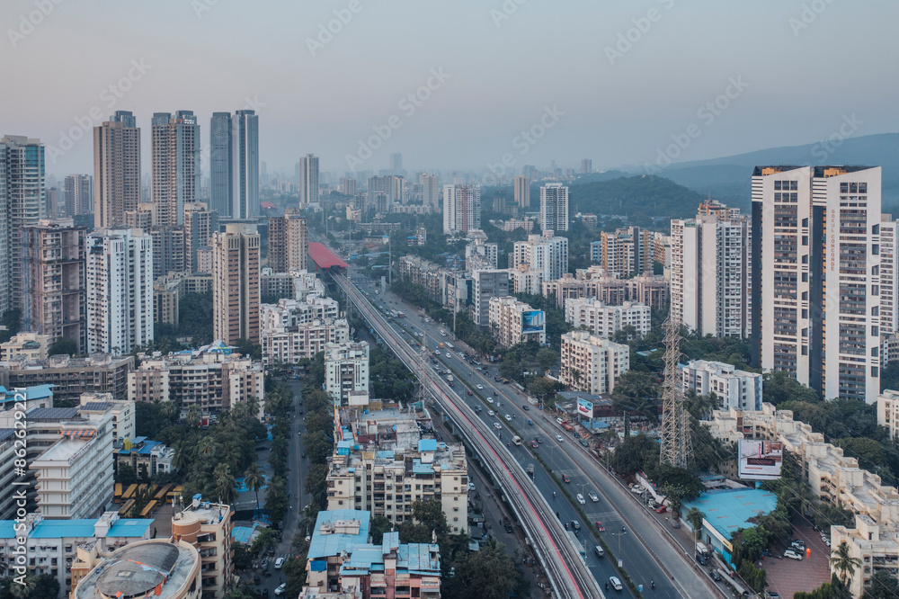 Aerial view of modern Mumbai skyline with busy highway and traffic, Mumbai, India. Aerial view of modern Mumbai skyline with busy highway and traffic, Mumbai, India.