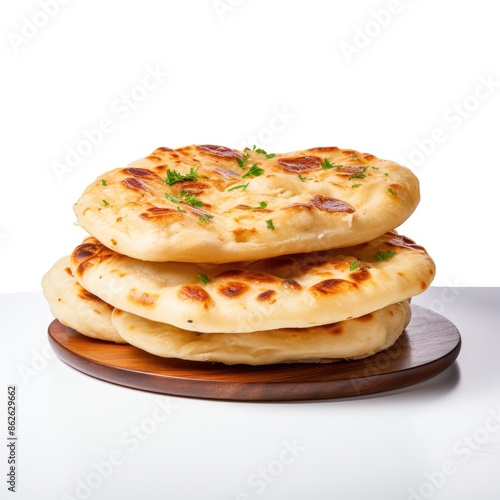 Soft And Fluffy Kulcha Bread On A Wooden Plate