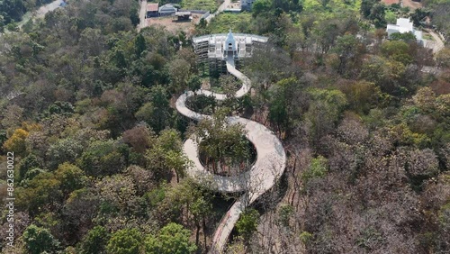 Aerial view of the skywalk in Phayao province of Thailand. Located on Wat Phrathat Chom Thong temple for viewing Phayao lake the largest freshwater lake in the northern Thailand. photo