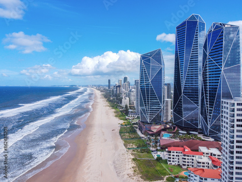 Aerial view of beach, skyscrapers, and ocean in Surfers Paradise, Gold Coast, Australia. photo