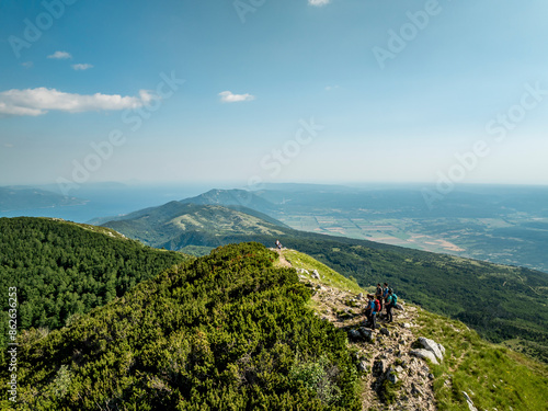 Aerial view of hikers exploring Ucka mountain trail, Croatia. photo