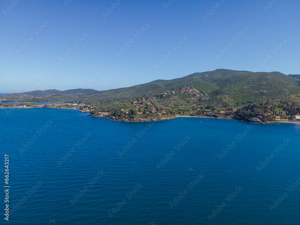 Aerial view of Porto Santo Stefano coastline, Mount Arrgentario, Grosseto, Tuscany, Italy. Aerial view of Porto Santo Stefano coastline, Mount Arrgentario, Grosseto, Tuscany, Italy.