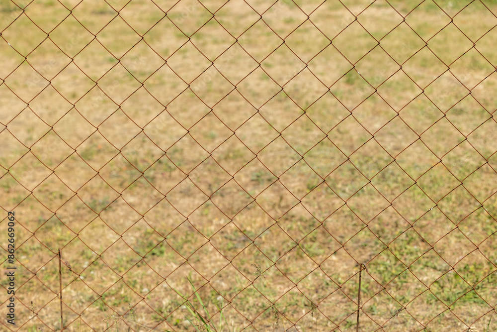 Fototapeta premium Texture of rusty wire mesh