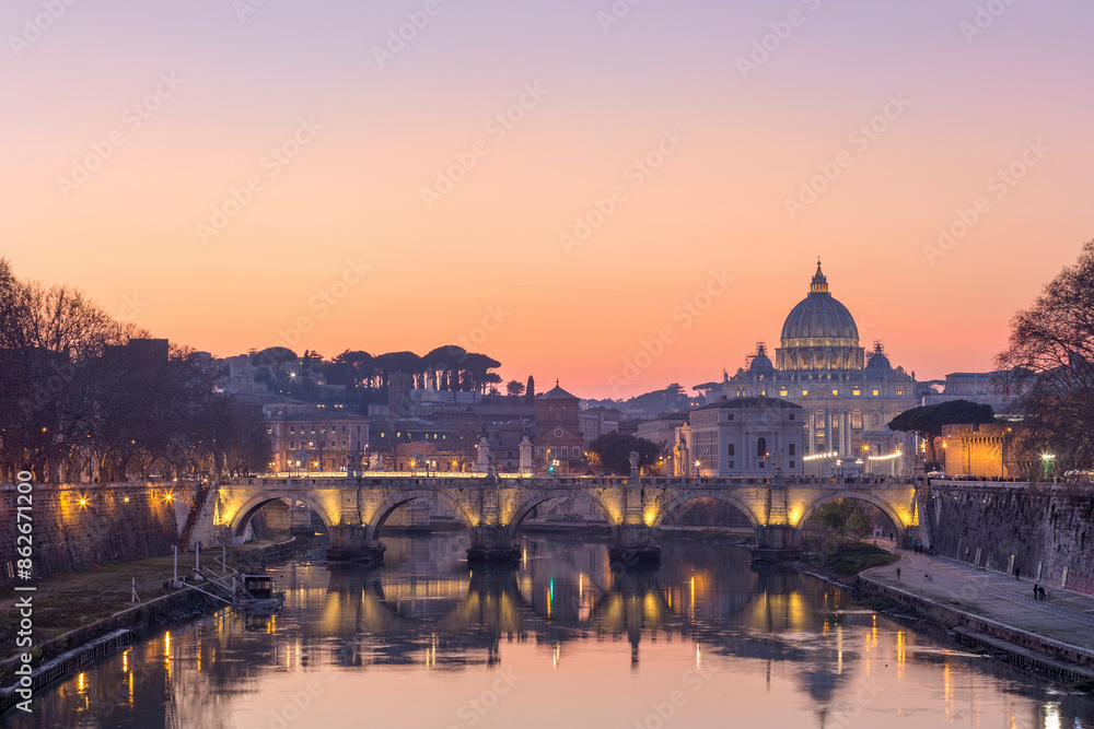 View of Ponte Sant'Angelo at sunset with St Peter's Basilica and river, Vatican. View of Ponte Sant'Angelo at sunset with St Peter's Basilica and river, Vatican.