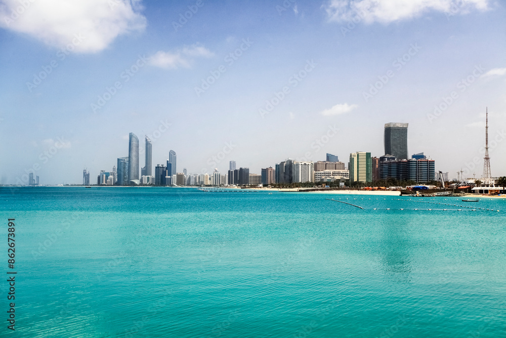View of modern cityscape with waterfront and skyline, Abu Dhabi, United Arab Emirates. View of modern cityscape with waterfront and skyline, Abu Dhabi, United Arab Emirates.