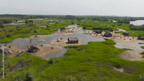 Aerial view of wetland village with huts and water in Djegbadji, Republic of Benin. photo