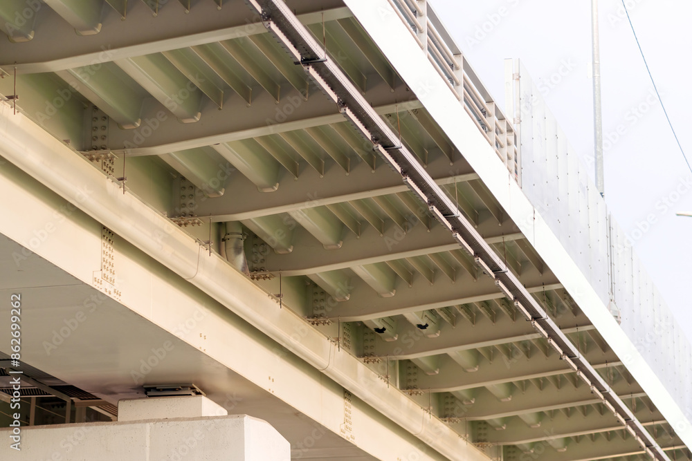 underside of a reinforced concrete car bridge, showcasing structural strength and modern infrastructure design from a unique perspective underside of a reinforced concrete car bridge, showcasing structural strength and modern infrastructure design from a unique perspective