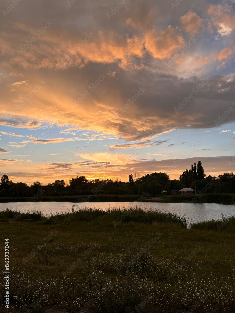 Obraz premium sunset over the river
