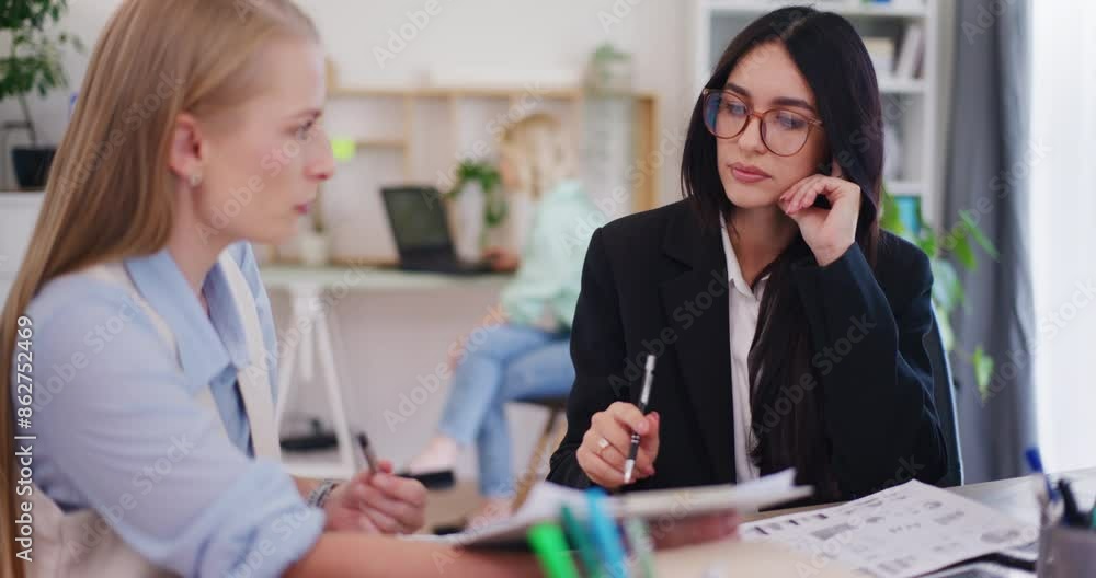 Female Employees Discuss Project and Sales Strategy Female Employees Discuss Project and Sales Strategy