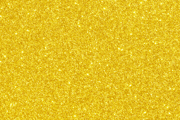 Golden yellow glitter light shiny texture background. New Year, Christmas, Wedding, Anniversary and Celebration background concept. 