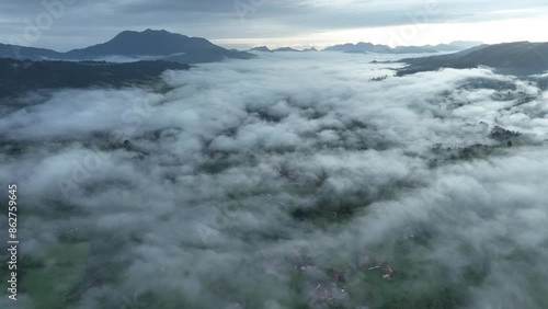 Wallpaper Mural Aerial view of fog-covered mountains and serene valley, Infiesto, Asturias, Spain. Torontodigital.ca
