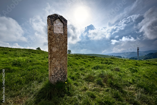 Obraz na płótnie Religious stone with bas-relief among the pastures of Lessinia. Velo Veronese, Veneto, Italy. w salonie