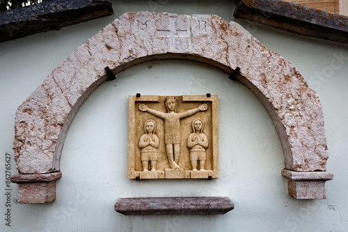 Valdiporro: ancient folk sculpture of the crucifixion of Jesus Christ at the church of Sant'Antonio Abate. Bosco Chiesanuova, Lessinia, Veneto, Italy. photo