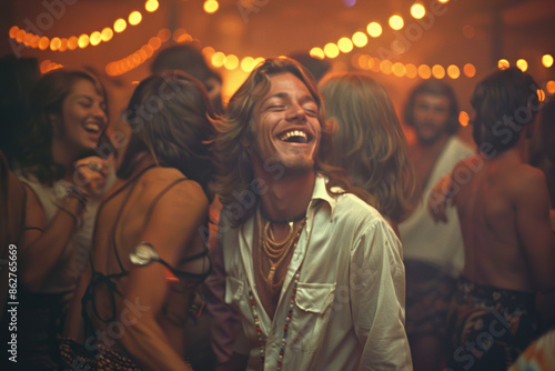 Young people dancing at a hippy party