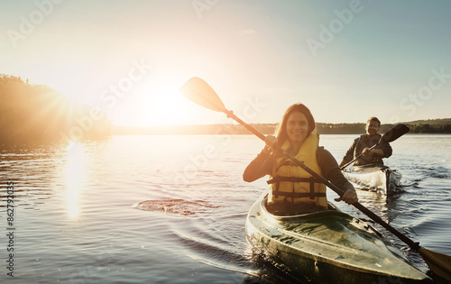 Quadro su tela Couple, happy and lake outdoor for kayak or water sports in nature, paddling and rowing together for river journey
