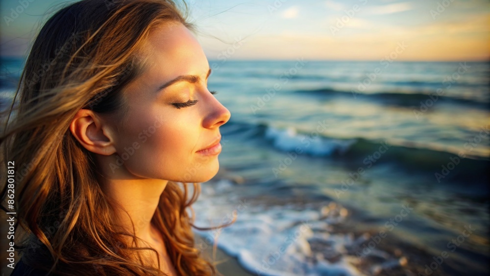 Meditating woman with closed eyes on the ocean shore
Meditating woman with closed eyes on the ocean shore