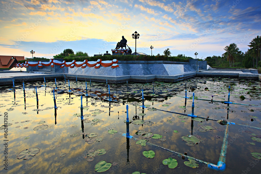 Fototapeta premium The monument depicts a bronze statue of King Mongkut in naval uniform, seated on a chair at Waghor King Mongkut Memorial Park of Science and Technology, Prachuap Khiri Khan province Thailand 