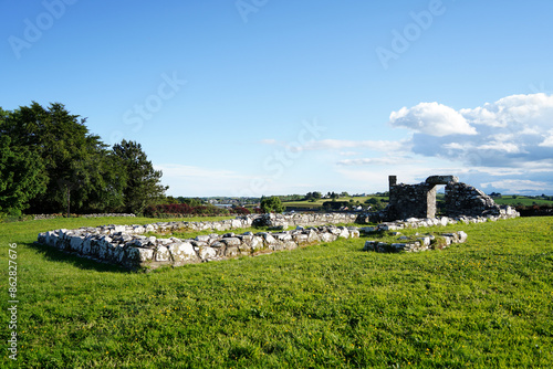 Nendrum Monastic Site. Pre-Norman monastic site ruins at Mahee Island in Strangford Lough, County Down, Northern Ireland photo