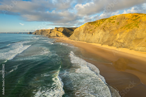 Exploring Cordoama Beach in Algarve, Portugal Through Drone Photography photo