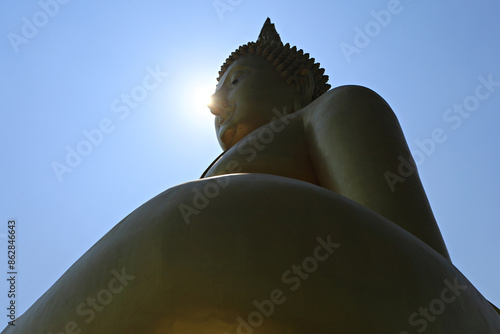 The largest golden Buddha statue at Wat Muang Temple in Ang Thong Province, Thailand 