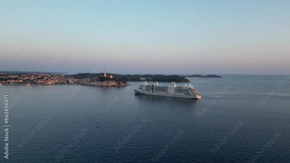 Aerial view of serene twilight over Pula's coastline with cruise ship, Istria, Croatia. Aerial view of serene twilight over Pula's coastline with cruise ship, Istria, Croatia.
