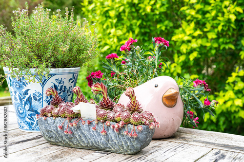 Pottery with floral decoration on a table, Belgium photo