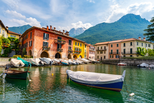 The town of Mandello del Lario, on Lake Como, the small port, the houses and the lake. photo